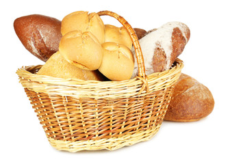 Composition with bread and rolls in wicker basket isolated