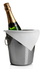 Bottle of champagne in pail isolated on white