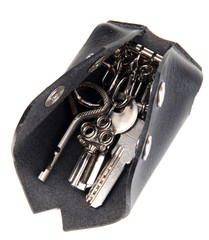 Black leather key case isolated on white