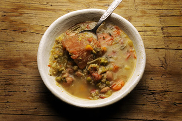 Minestra con crosta di formaggio grana Soup with cheese crust