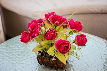 Pink roses on white table