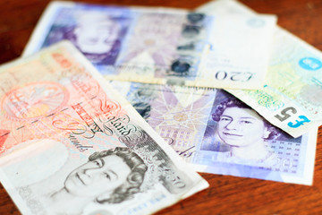 Fototapeta premium Euro currency on wood background texture