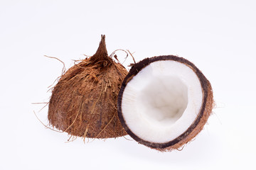 sectioned coconut isolated on white background close up