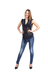 Full body portrait of a casual  happy woman model standing