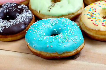 Donuts on a wooden background