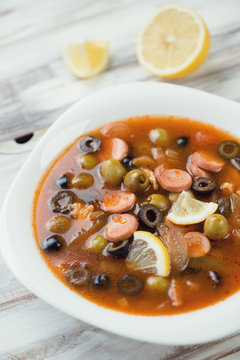 Close-up of solyanka - russian soup with various ingredients