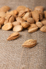 Almonds nuts on sackcloth