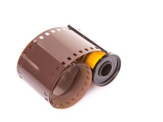 35mm still camera film cartridge over white background
