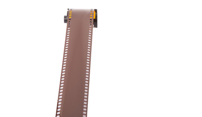 35mm still camera film cartridge over white background