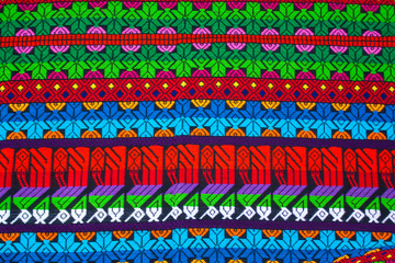 Mayan ornament on a blanket at Chichicastenango market Guatemala