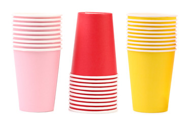 Three different color cups in a row.