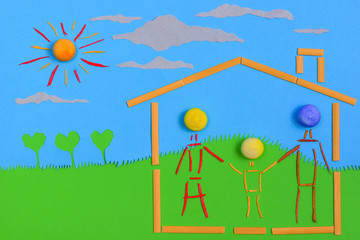 Fototapeta na wymiar Figurative family on a house, on a sunny day