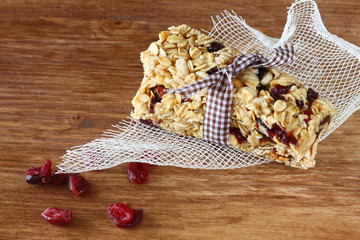 granola bar or energy bar on wooden background