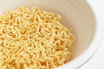 Dry instant noodle in a bowl