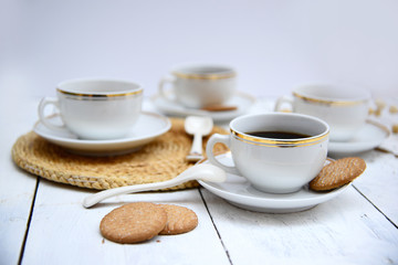 Fototapeta na wymiar Morning coffee on gold, orange and white