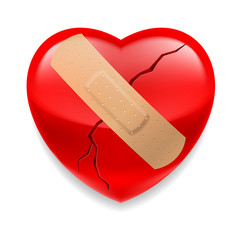Cracked red heart  with plaster