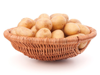 Potato tuber  in wicker basket isolated on white background