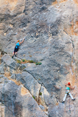 Female climber on a rock