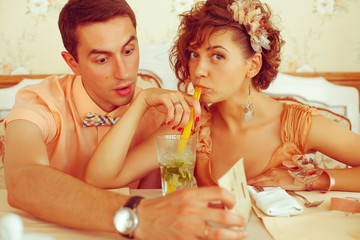 Happy marriage concept. Beautiful married couple in cafe