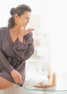 Young Woman Smelling Soap