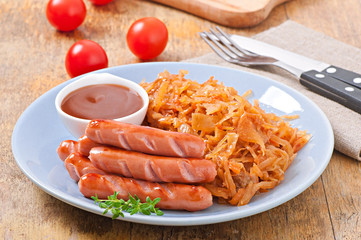 Sausages and fried cabbage