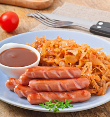 Sausages and fried cabbage