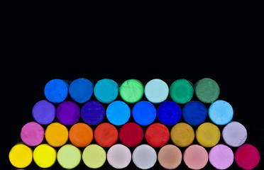 Stacked colorful pastels.Educational background.