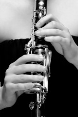Fototapeta premium Hands of Female Musician Playing Clarinet