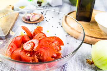 Freshly chopped tomatoes glass dish