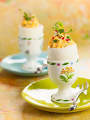 Stuffed eggs in egg cups