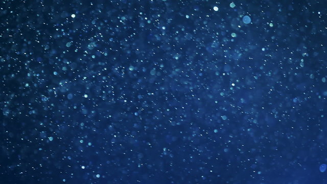 Flying dust particles abstract blue background, HD 1080p