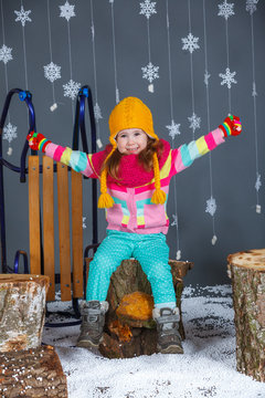 Funny girl in winter clothes.