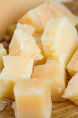 parmesan cheese on wooden surface