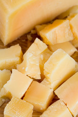 parmesan cheese on wooden surface