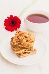 Slices of delicious fresh baked  apple cake on a wooden surface