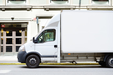 White truck in profile, copy space