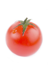 one fresh red tomato isolated on white