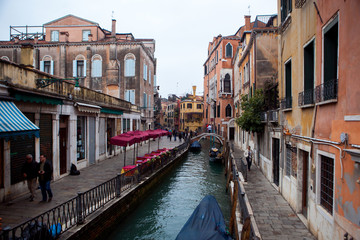 Venice. Italy. Narrow street - the channel.