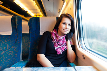 Young woman travelling by train