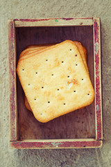 Square crackers in vintage box.