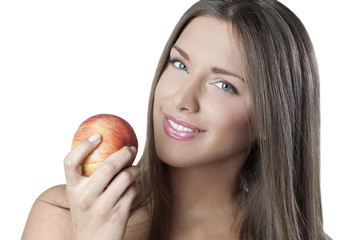 Attractive woman holding an apple isolated on white background