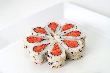 Sushi nicely decorated forming hearts  shapes on white square di