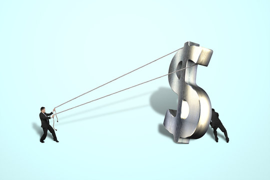 Businessmen standing large matel money symbol