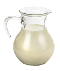 Clear glass jug with milk