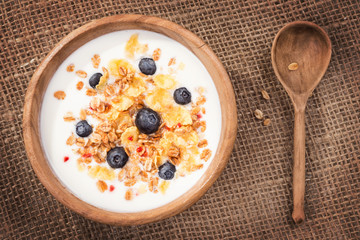 Muesli with yogurt and fresh blueberries. Top view