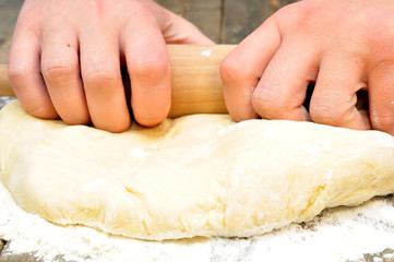 Unrolling dough with a rolling pin