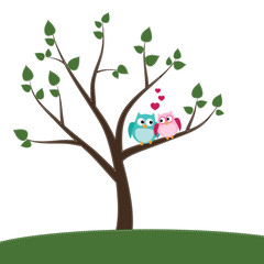 Two owls in love sitting on a branch