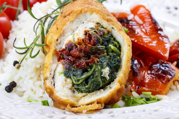 Chicken roll stuffed with spinach and dried tomatoes
