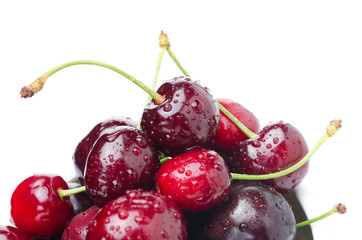 fresh cherries on a white background, close-up selective focus