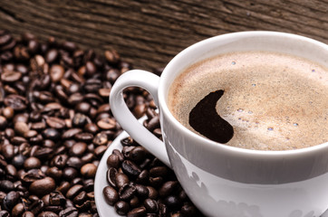 Coffee cup and coffee beans